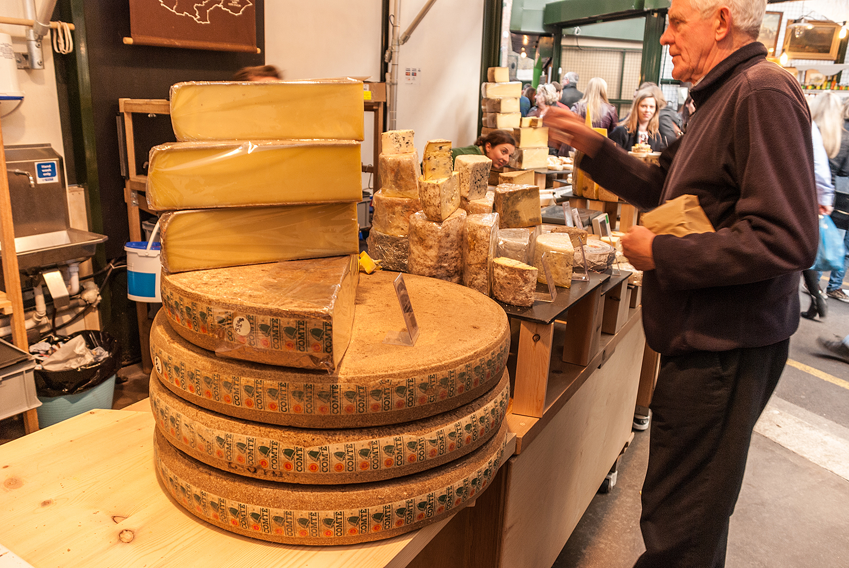 Spectacular wheels of Comté cheese produced in the Jura Massif region and matured in the 19th century Fort Saint Antoine