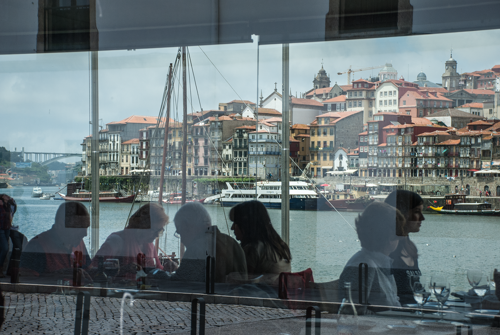 Restaurants at Vila Nova de Gaia look across the Douro to Praça da Ribeira.