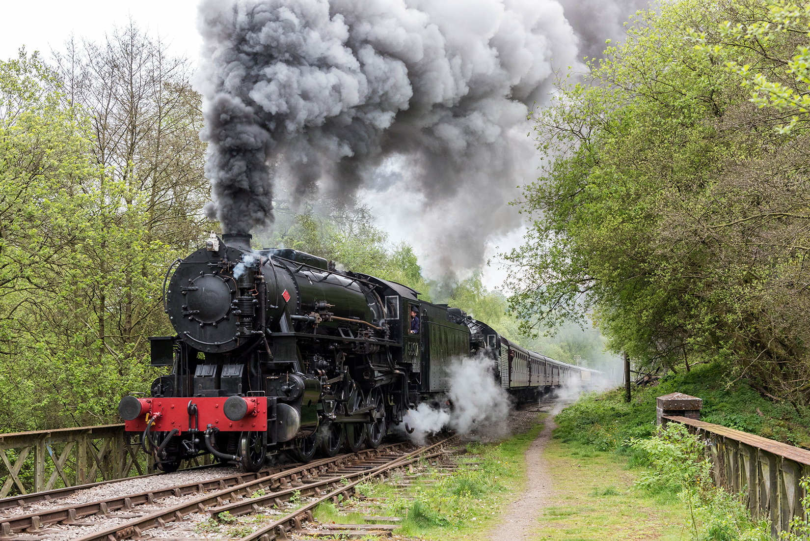 5197 and 6046 storming through Leek Valley Junction at the start of the climb to Ipstones.